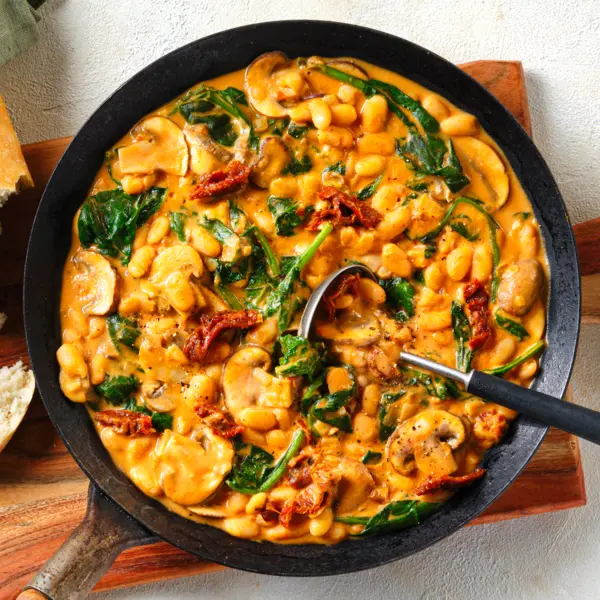 Haricots blancs à la crème, épinards et tomates