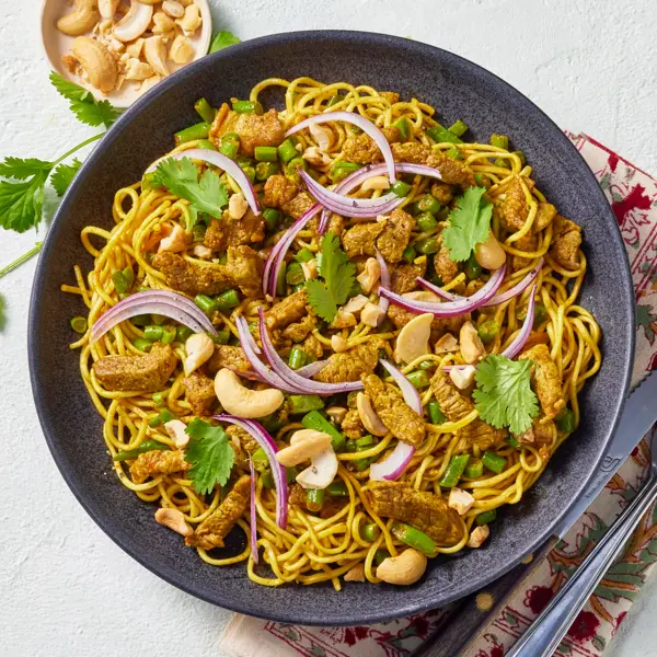 Nouilles au curry & agneau sauté