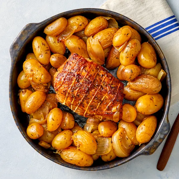 Rôti de porc confit et pommes de terre