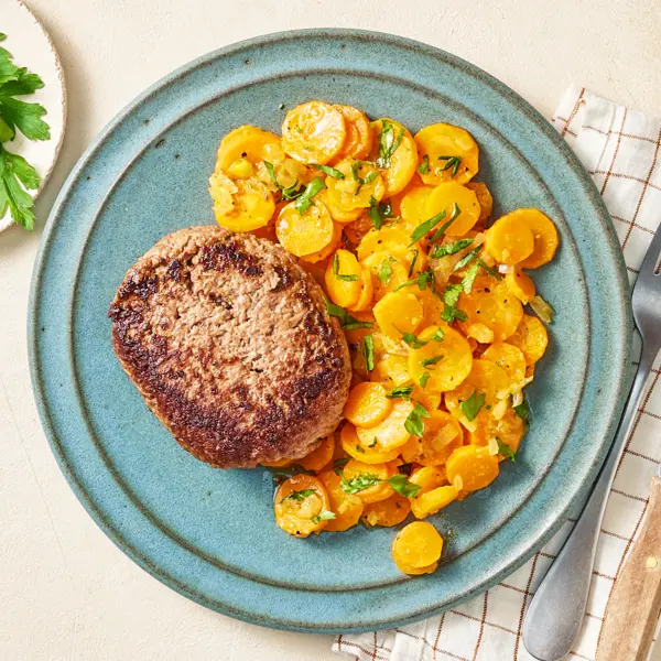 Steak haché, carottes au cumin et jus d'orange